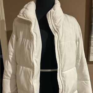 Women's White Puffer zip up Jacket size XS petite. Jacket has pockets.